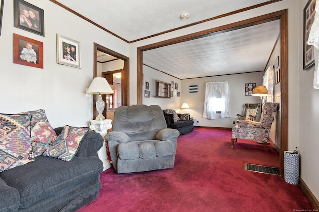 carpeted living room with visible vents, baseboards, and ornamental molding