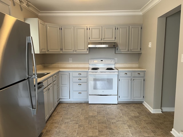 kitchen with under cabinet range hood, light countertops, ornamental molding, freestanding refrigerator, and white electric stove