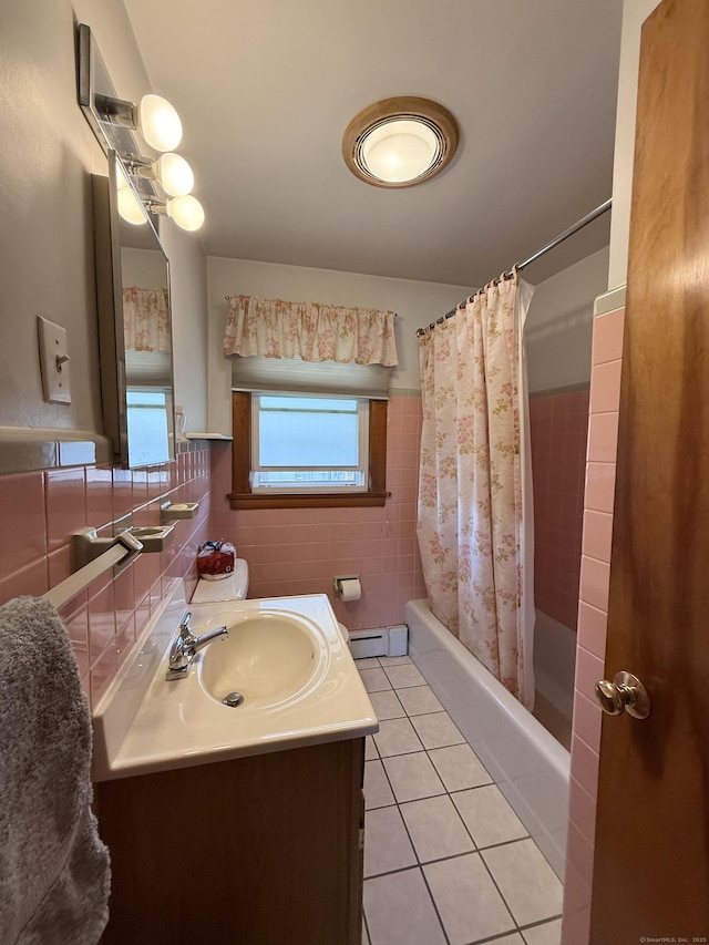 bathroom featuring tile walls, a baseboard heating unit, tile patterned floors, vanity, and shower / bathtub combination with curtain