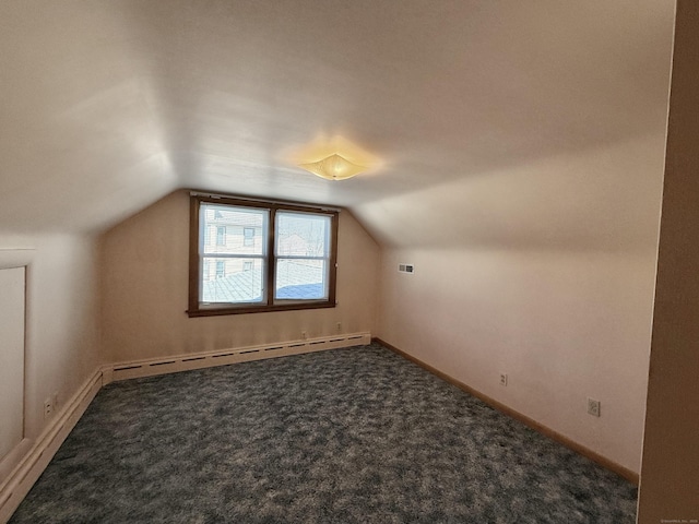 bonus room with a baseboard radiator, baseboards, carpet flooring, and vaulted ceiling