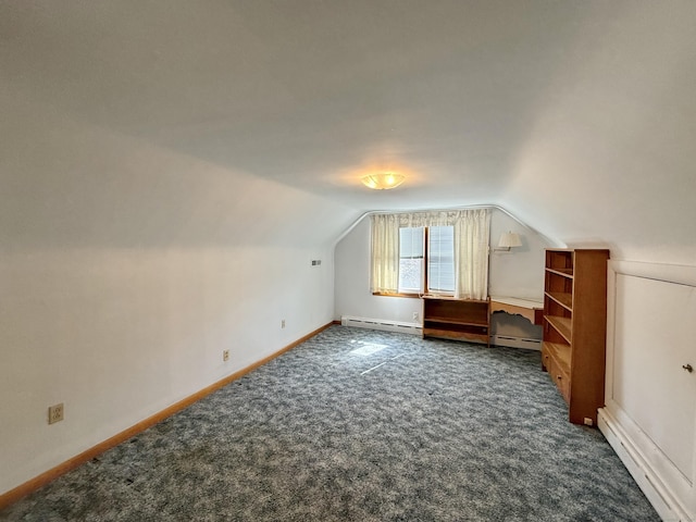 bonus room with dark colored carpet, baseboards, baseboard heating, and vaulted ceiling