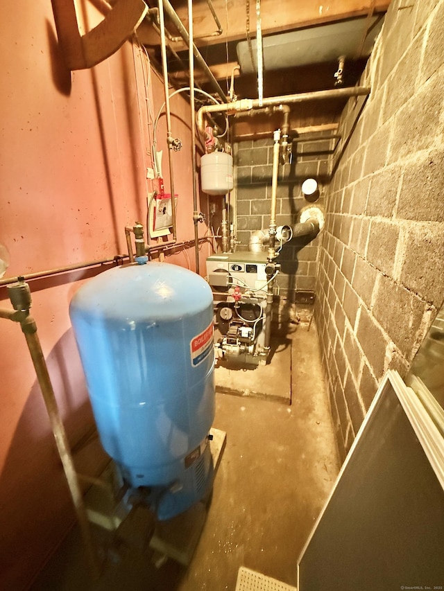 utility room featuring a heating unit