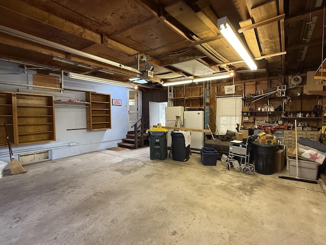 garage featuring freestanding refrigerator