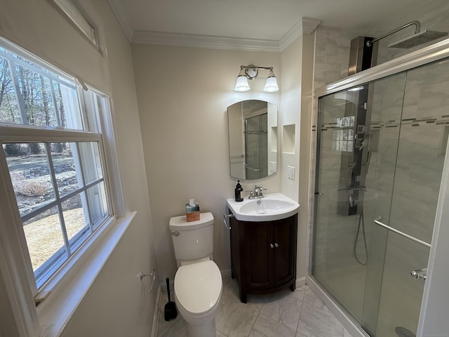 full bath featuring plenty of natural light, a shower stall, and crown molding
