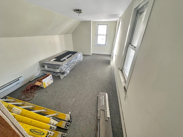 63 Minerva St, Derby, CT 06418 - interior space with a baseboard radiator, baseboards, carpet, and vaulted ceiling
