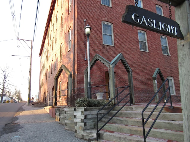 view of front of home with brick siding