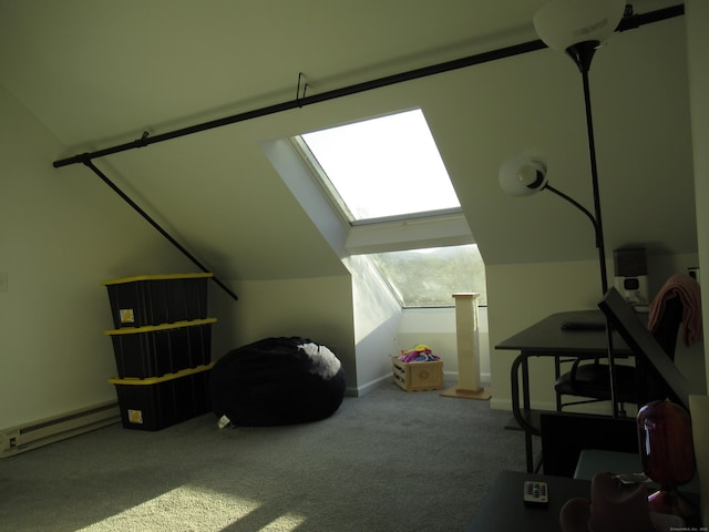 additional living space featuring a baseboard heating unit, lofted ceiling with skylight, and carpet