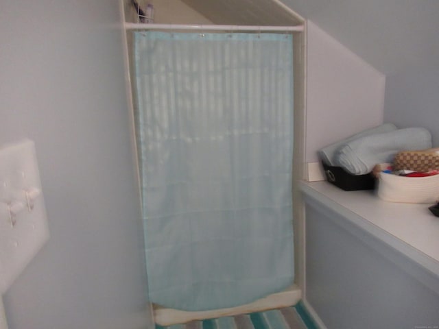 bathroom with curtained shower