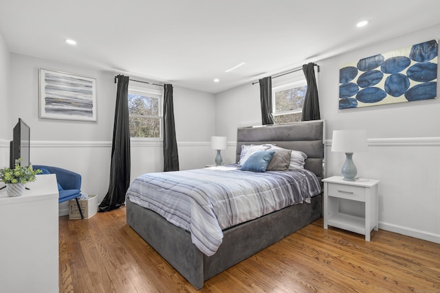 bedroom featuring recessed lighting and wood finished floors