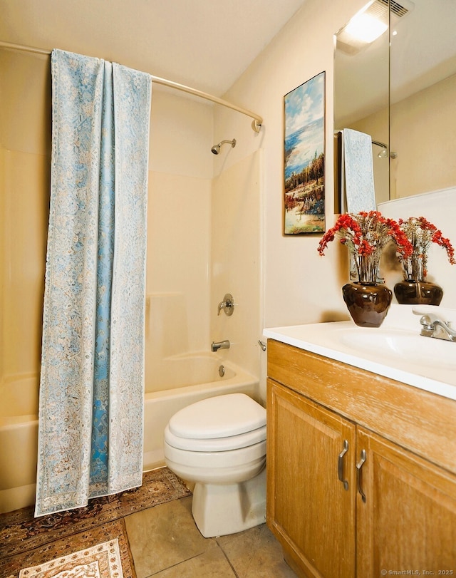 bathroom featuring bathtub / shower combination, tile patterned floors, toilet, and vanity