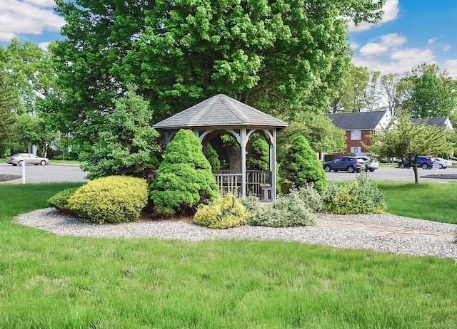 view of community with a gazebo and a yard