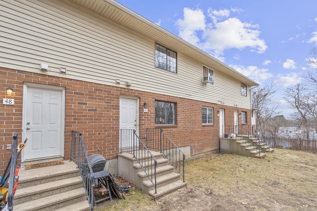 view of front of house with brick siding