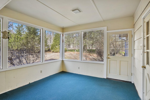 unfurnished sunroom with a wealth of natural light