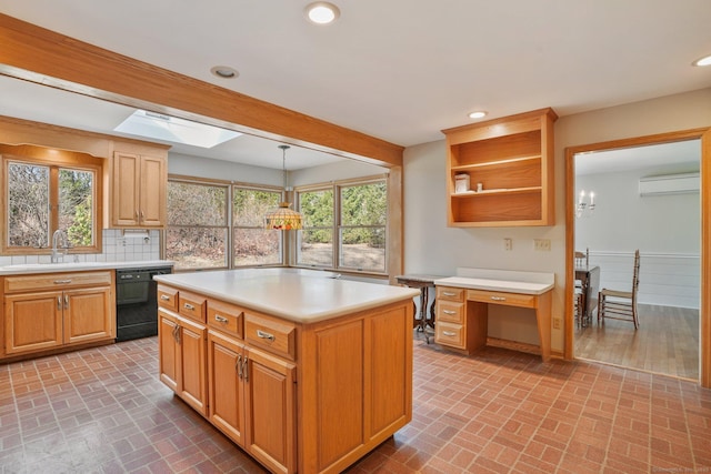 kitchen with recessed lighting, light countertops, black dishwasher, and a wall unit AC