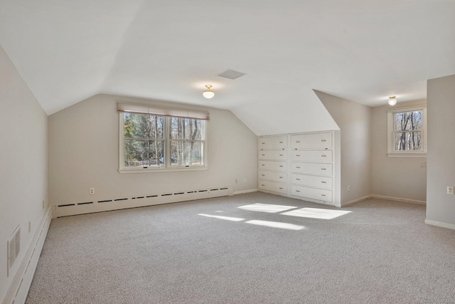 bonus room with visible vents, baseboards, carpet flooring, lofted ceiling, and baseboard heating