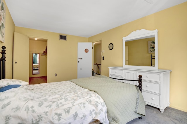 bedroom featuring visible vents and carpet floors