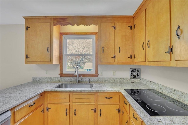 kitchen with dishwasher, a sink, black electric stovetop, and light stone countertops