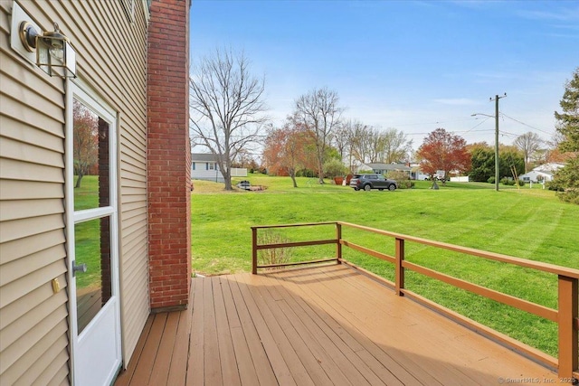 deck featuring a yard