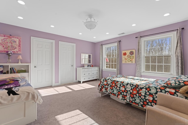 bedroom with recessed lighting, visible vents, and carpet flooring