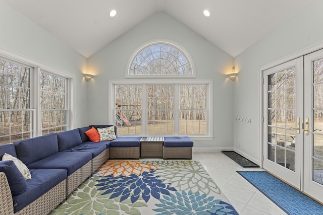 living area with tile patterned flooring, baseboards, recessed lighting, french doors, and high vaulted ceiling