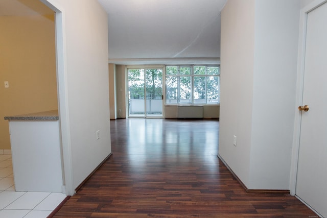 hallway with wood finished floors