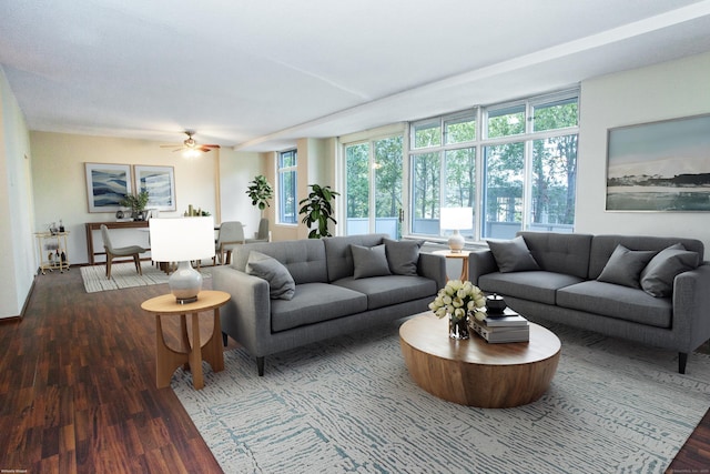 living room featuring wood finished floors and a ceiling fan