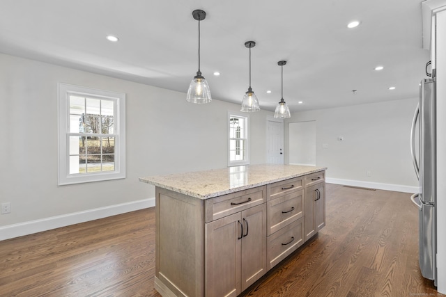 kitchen with recessed lighting, baseboards, dark wood-style flooring, and freestanding refrigerator