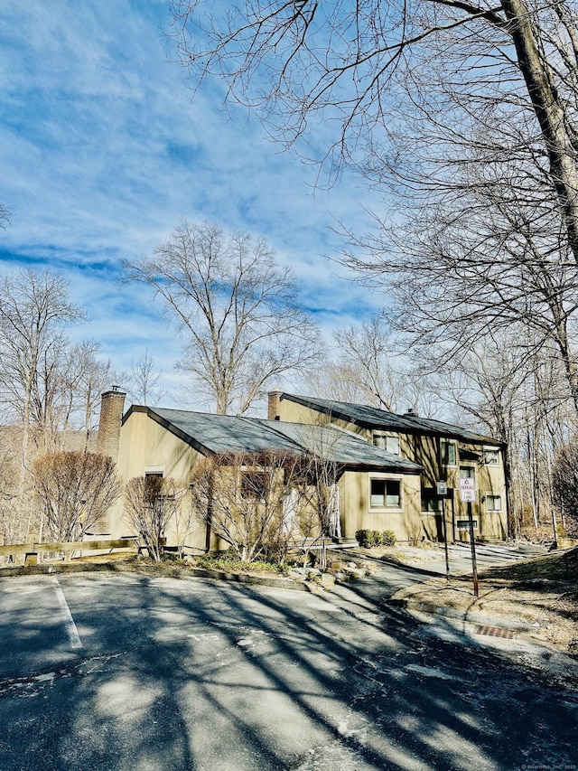 exterior space featuring a chimney