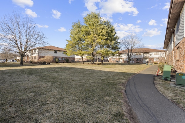 view of yard with a residential view