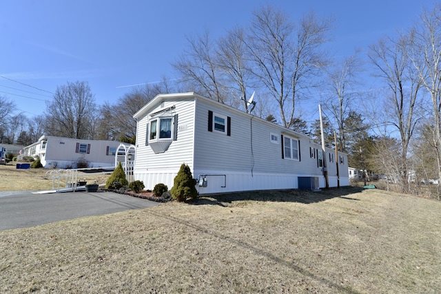 view of home's exterior featuring central air condition unit