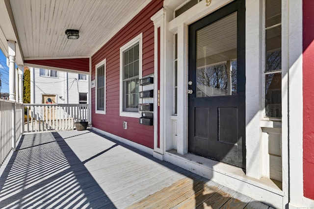 wooden deck featuring a porch