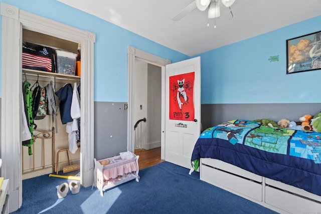 bedroom featuring a closet, carpet floors, and ceiling fan