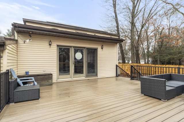 wooden deck featuring fence