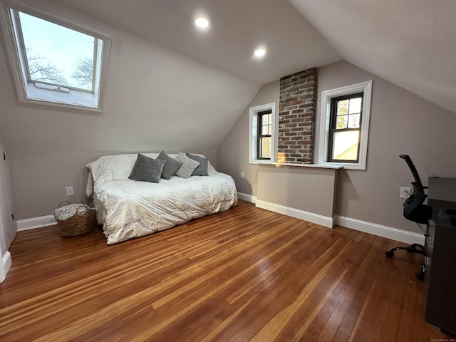 bedroom featuring vaulted ceiling, recessed lighting, baseboards, and hardwood / wood-style flooring