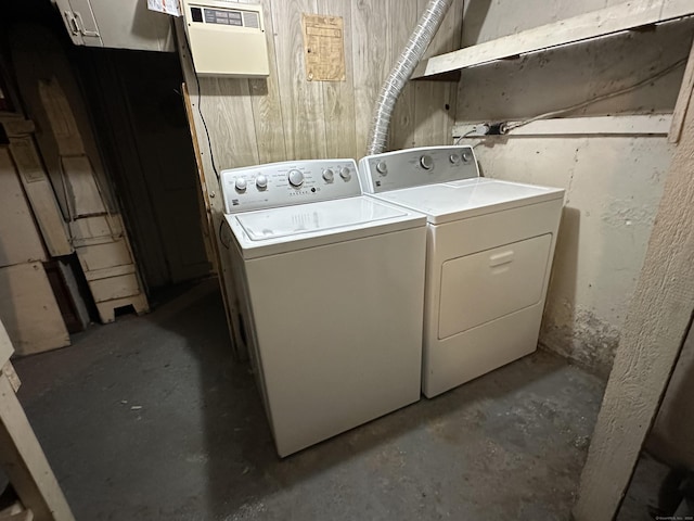 washroom featuring laundry area and washing machine and dryer