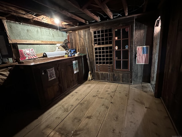 wine area featuring hardwood / wood-style flooring