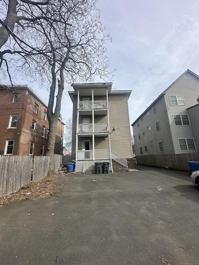 view of property with fence