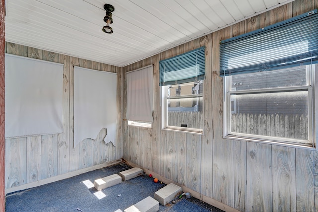 unfurnished sunroom featuring plenty of natural light