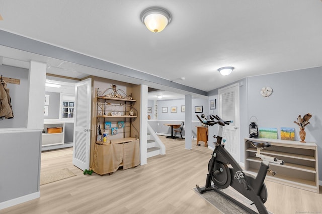 workout room featuring wood finished floors