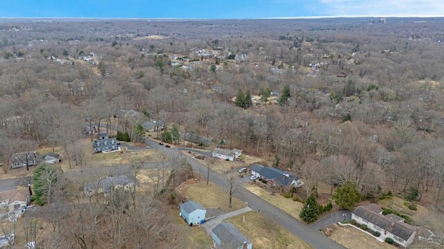 aerial view with a wooded view