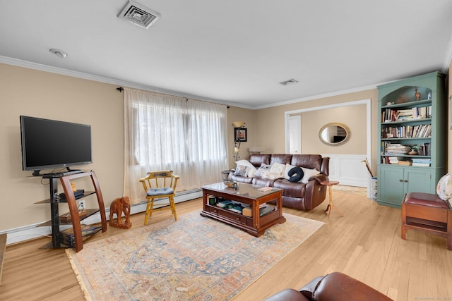 living area with light wood-style floors, visible vents, and ornamental molding