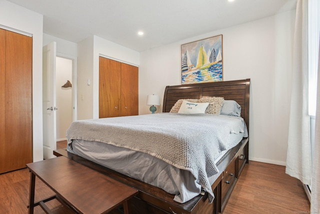 bedroom featuring recessed lighting, baseboards, and wood finished floors