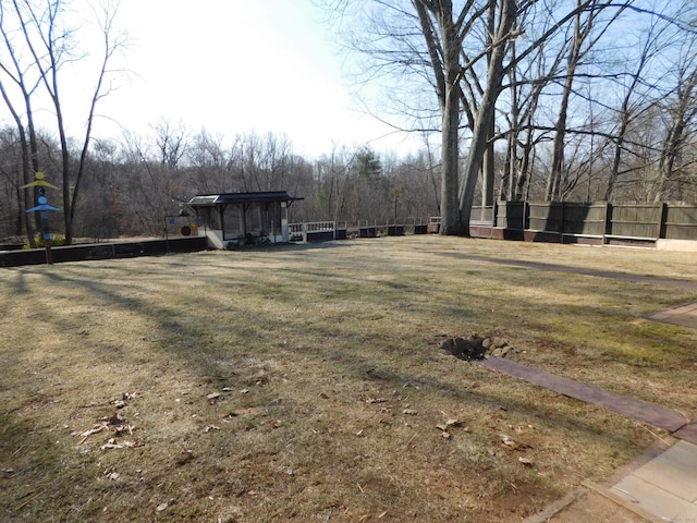 view of yard featuring fence