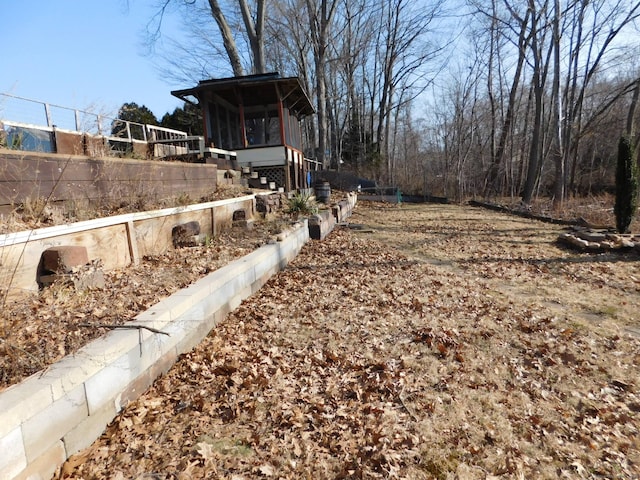 view of yard featuring a sunroom