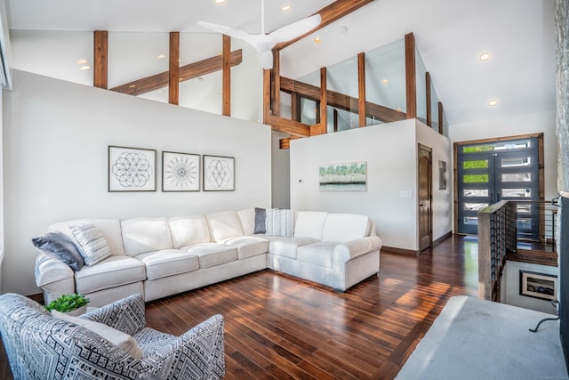 living room featuring beam ceiling, recessed lighting, high vaulted ceiling, and wood finished floors