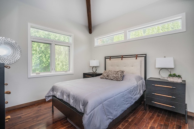 bedroom featuring beam ceiling, baseboards, and dark wood-style flooring