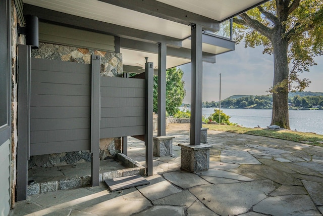 view of patio / terrace with a water view