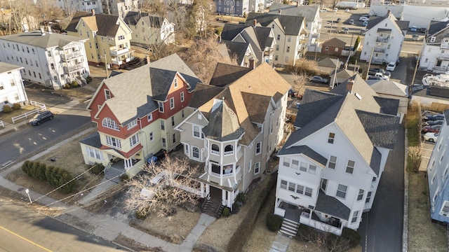 birds eye view of property with a residential view