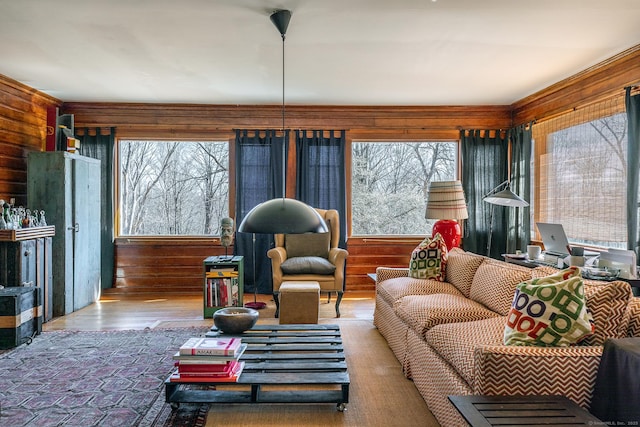 12 Old Forge Hollow Rd, Litchfield, CT 06750 - living room featuring plenty of natural light, wood walls, and wood finished floors