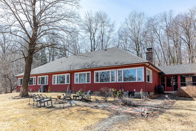 12 Old Forge Hollow Rd, Litchfield, CT 06750 - back of property featuring a chimney and roof with shingles
